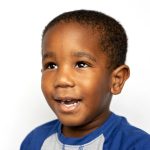 Fine Art School Photo of boy looking up and to the left against a white background